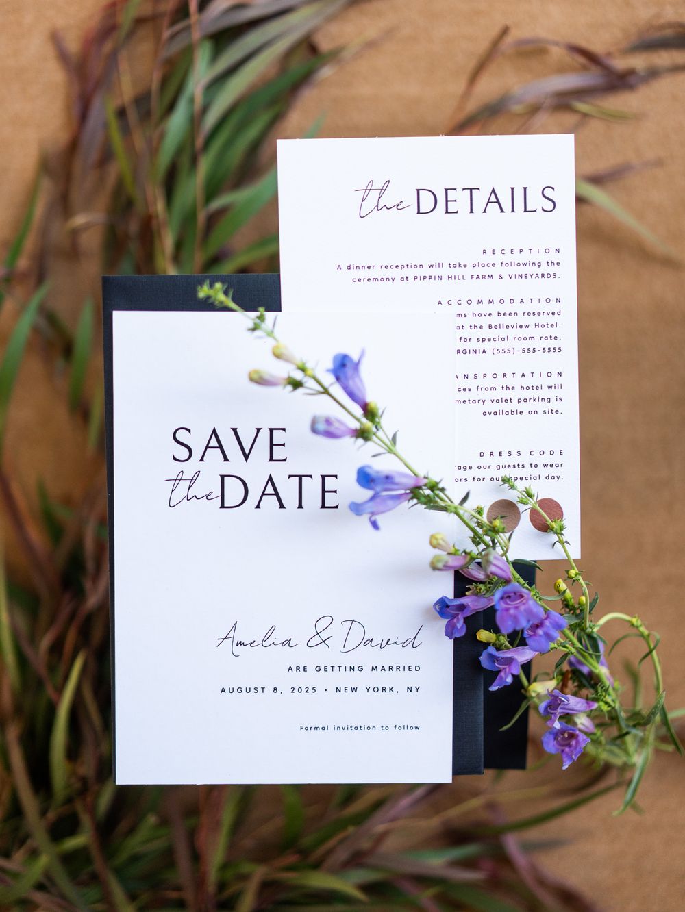 Close-up shots of elegant wedding save the date cards with purple flowers and minimalist design details.