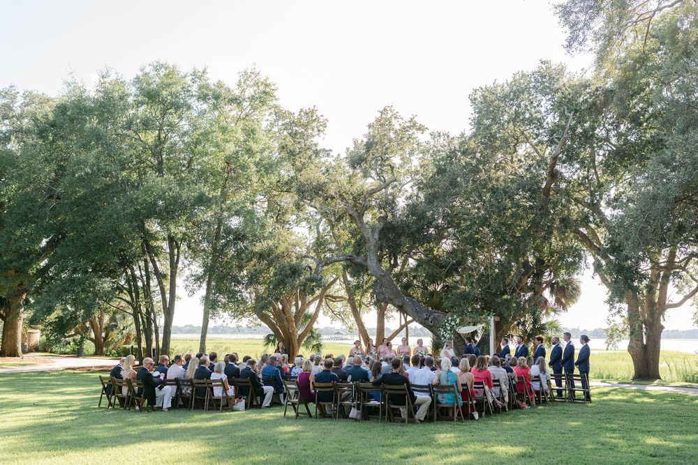 Lowndes Grove wedding photos from a top Charleston wedding photographer. See more timeless and candid wedding photos Lowndes Grove