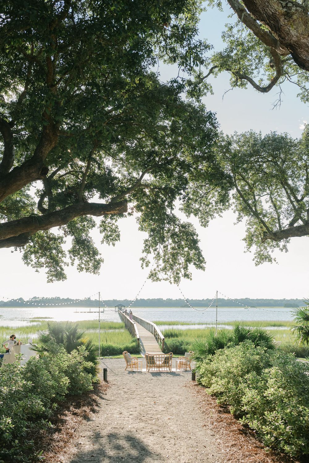 Lowndes Grove wedding photos from a top Charleston wedding photographer. See more timeless and candid wedding photos Lowndes Grove