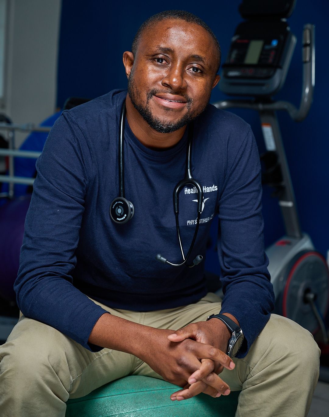 A doctor seating on a ball