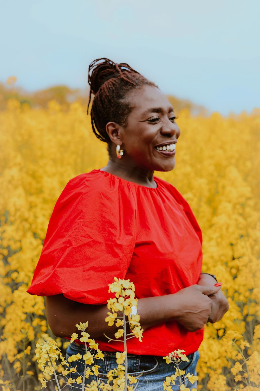 Personal branding, norfolk, flower field, natural light, vibrant, beautiful black woman smiling