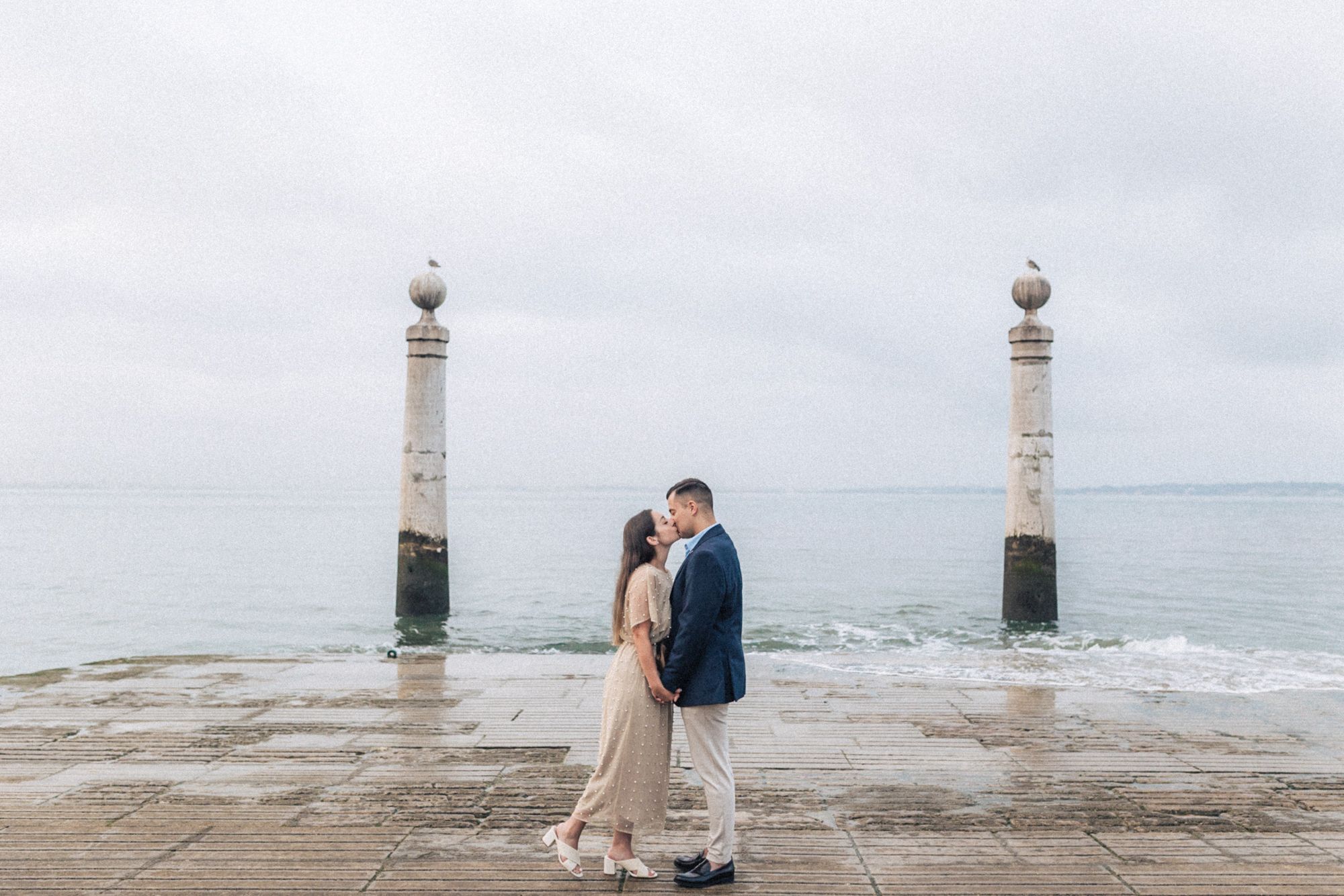 Romantic engagement photoshoot in terreiro do paço at the historic lisbon center during a Destination Wedding in Portugal