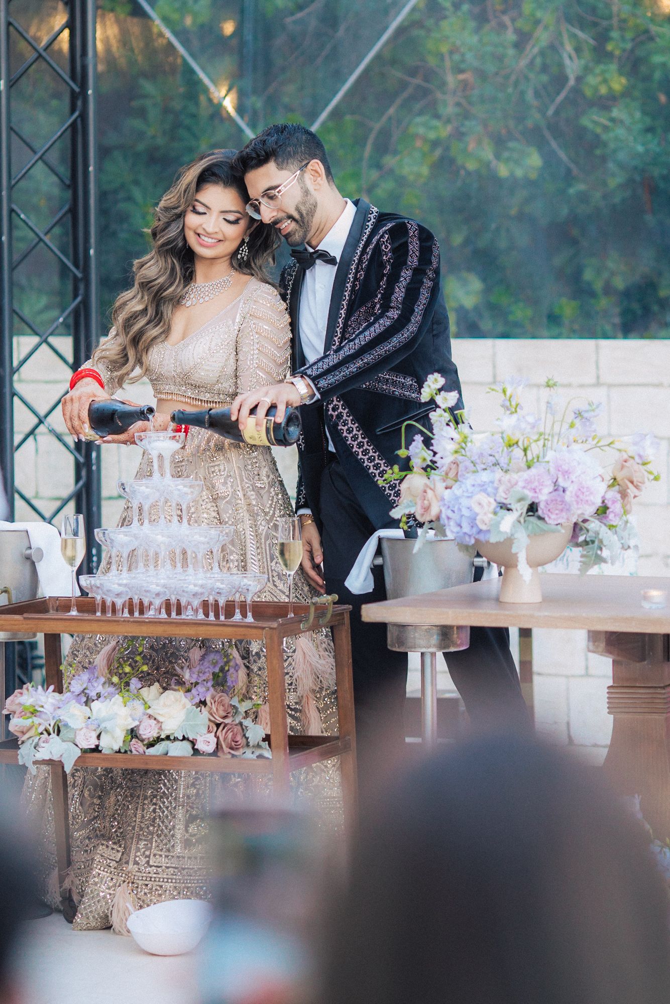 A magical Indian wedding reception at Forte da Cruz, overlooking the Atlantic Ocean. by a Lisbon Wedding Photographer