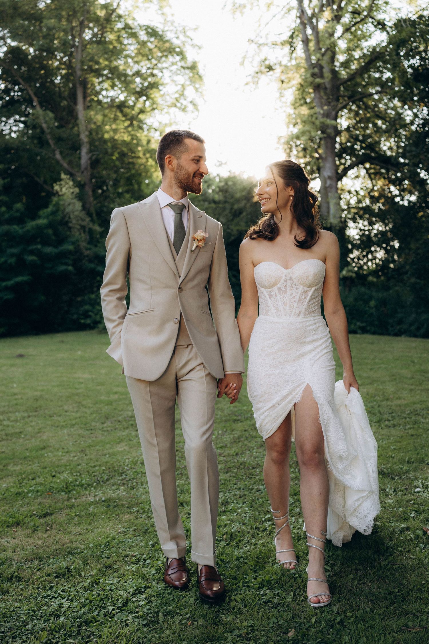 A tender autumn embrace captured during a wedding photoshoot with fall foliage.