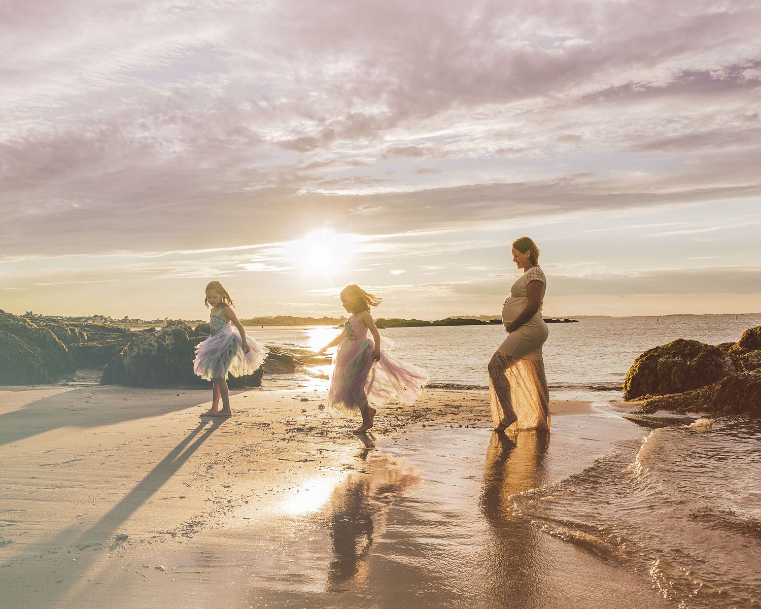 A dreamy composite series of beachside silhouettes at golden sunset captures figures dancing and playing in the ocean waves.