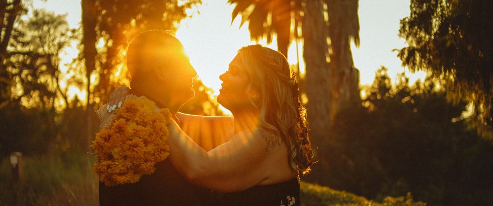 Cinematic movie still of couple dancing in the sunset