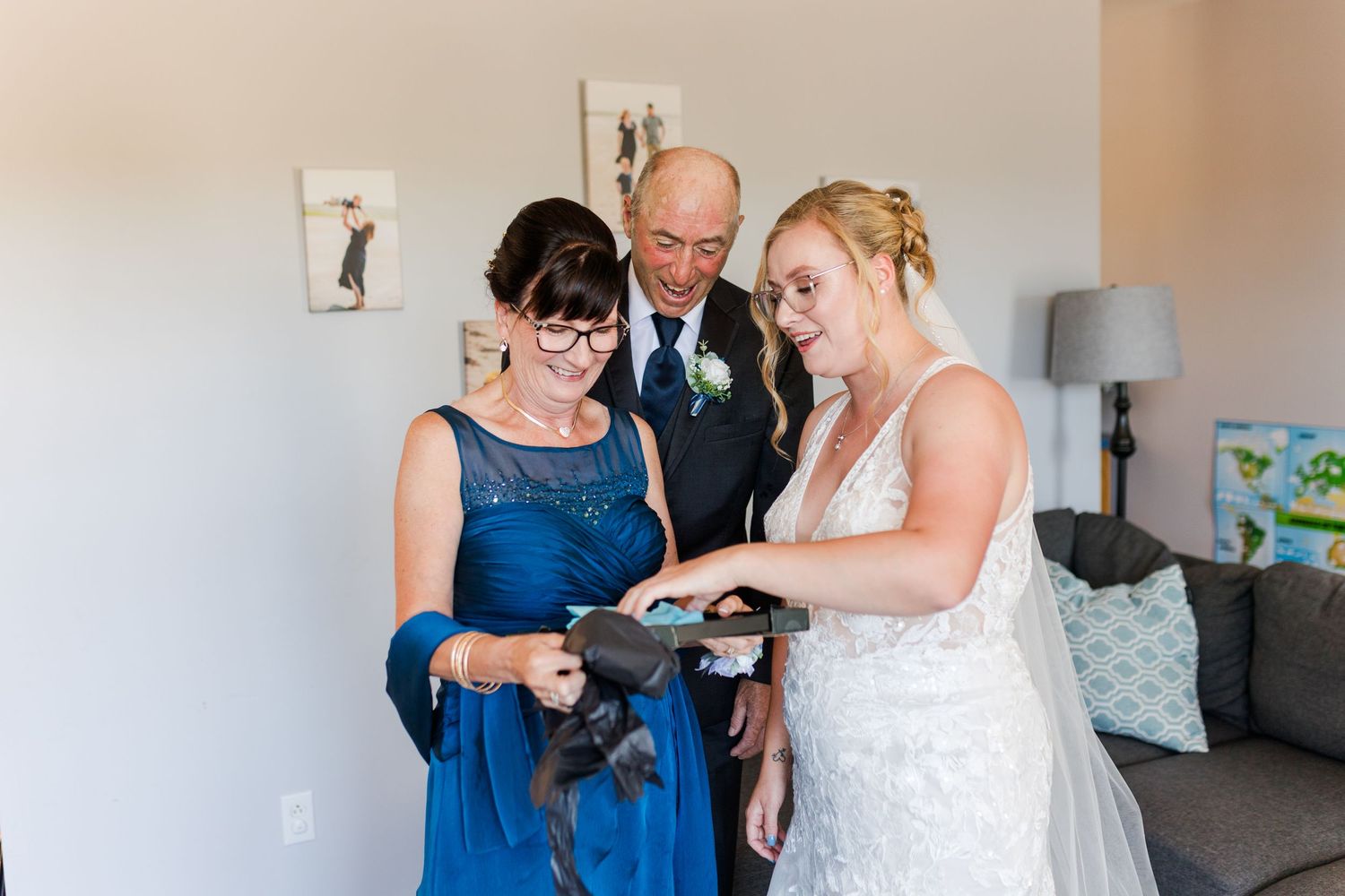 A series of wedding preparation moments showing a bride getting ready in a white dress while others assist with final touches.