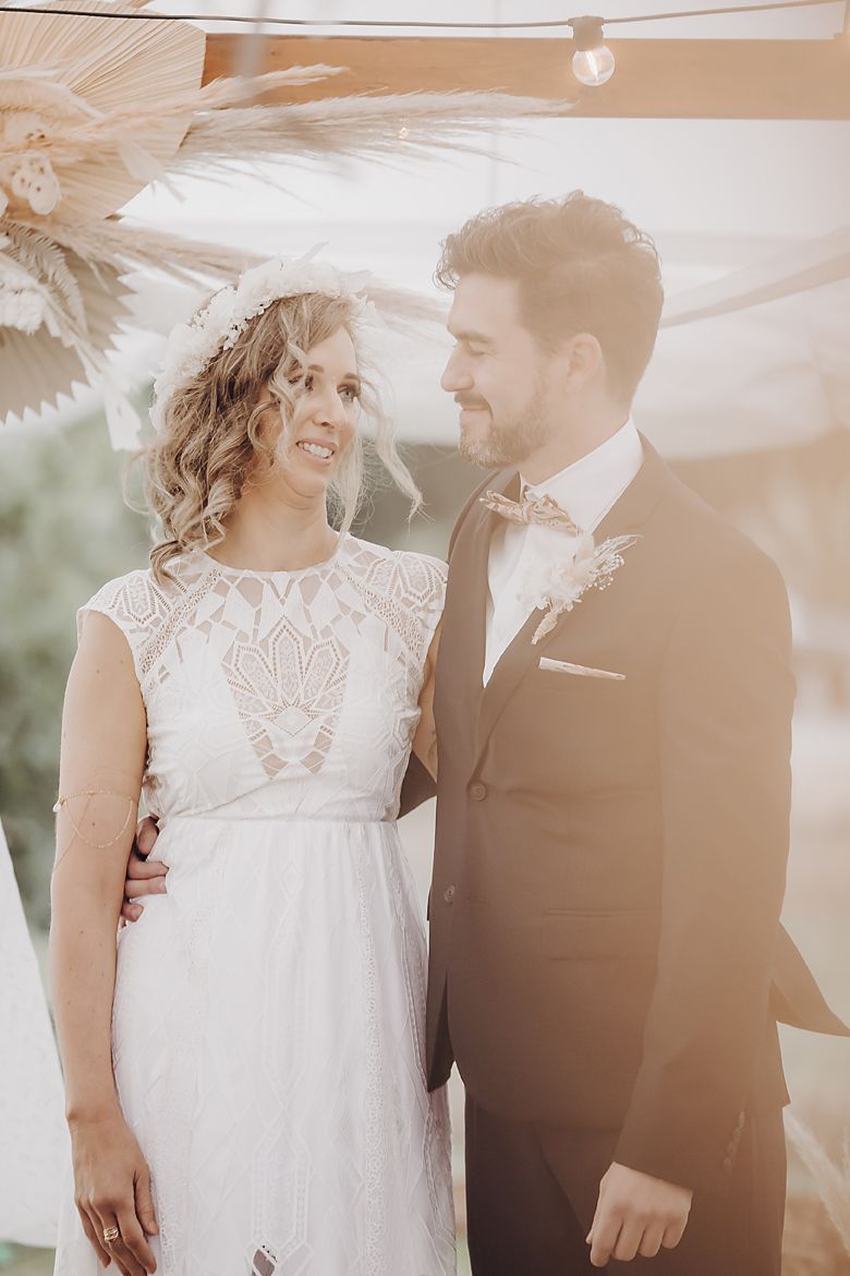 A couple shares intimate wedding moments in a dreamy, soft-focus sequence of romantic photos.