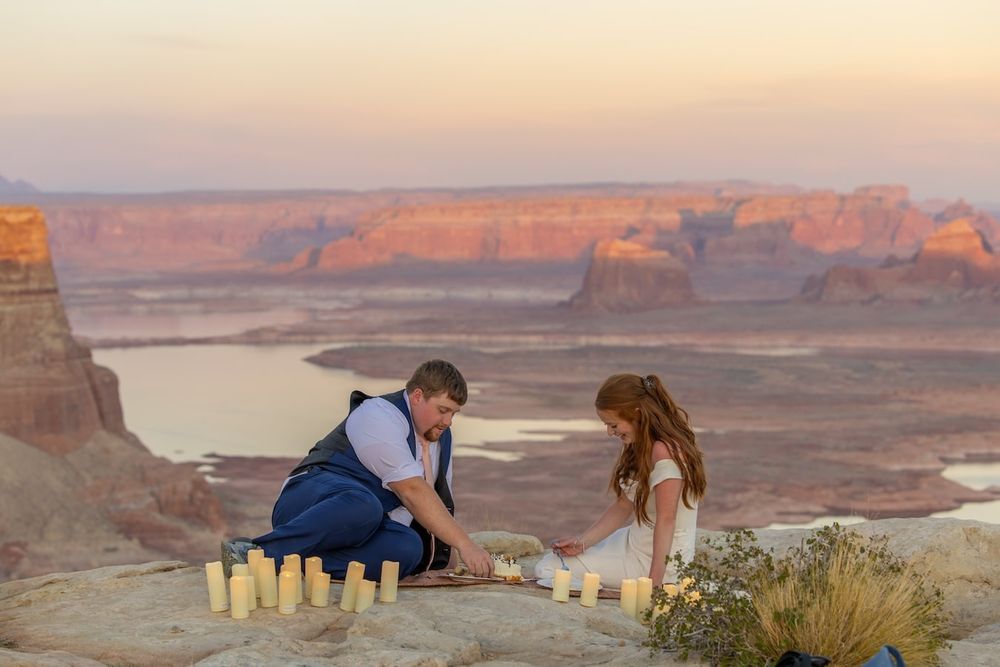 couple looking at each other at sunset over lake Powell