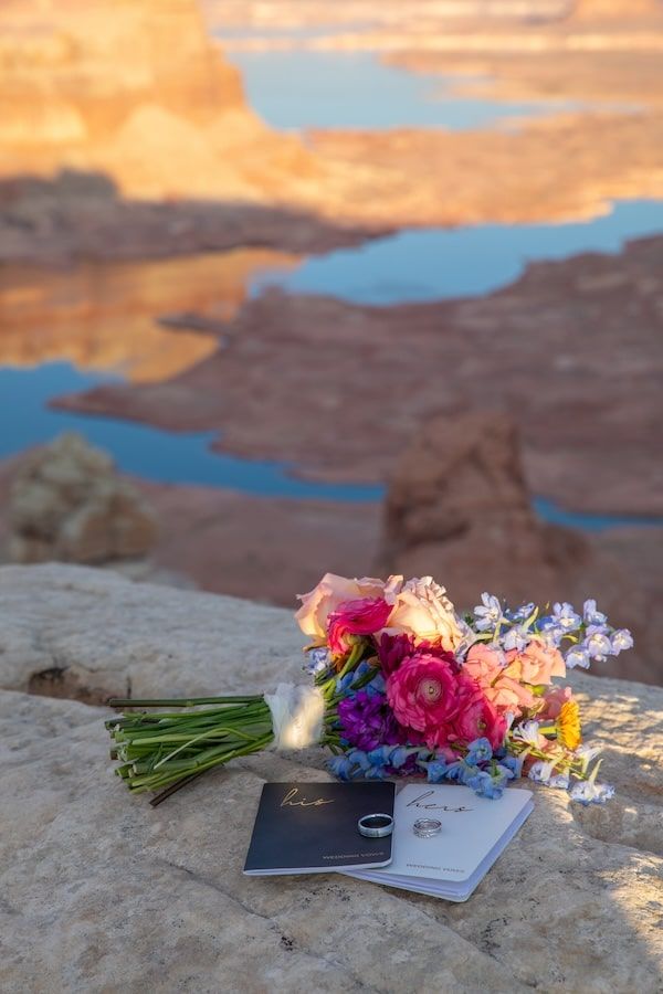 couple looking at each other at sunset over lake Powell