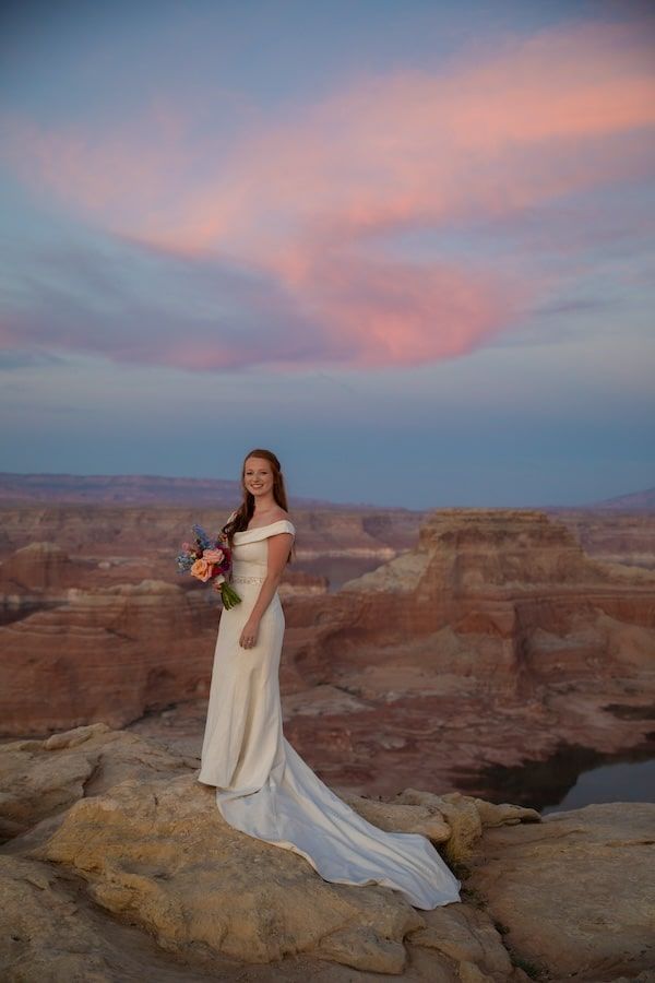 couple looking at each other at sunset over lake Powell