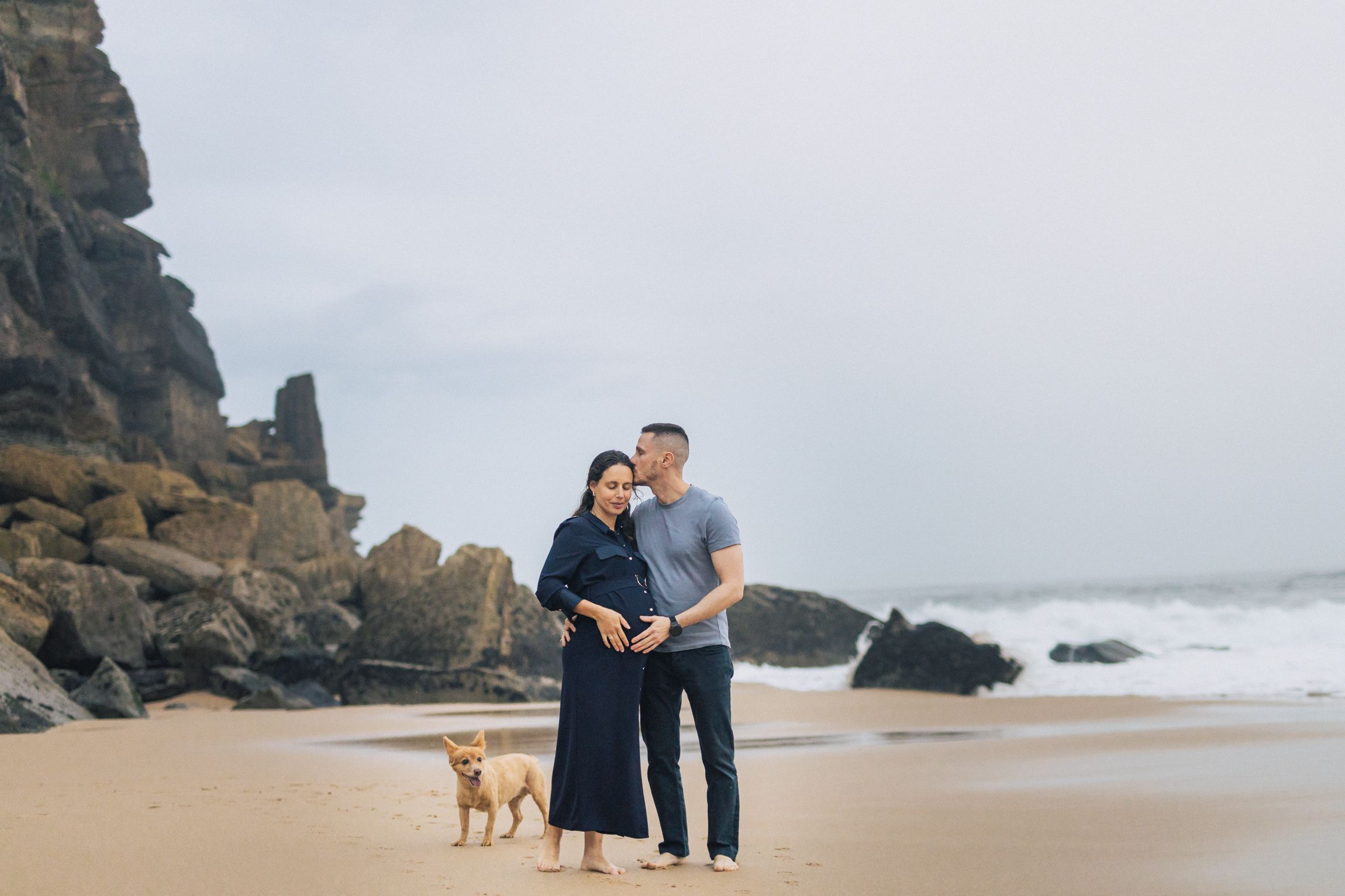 Natural and intimate pregnancy session at azenhas do Mar, portugal, capturing the beauty of a couple expecting their first child