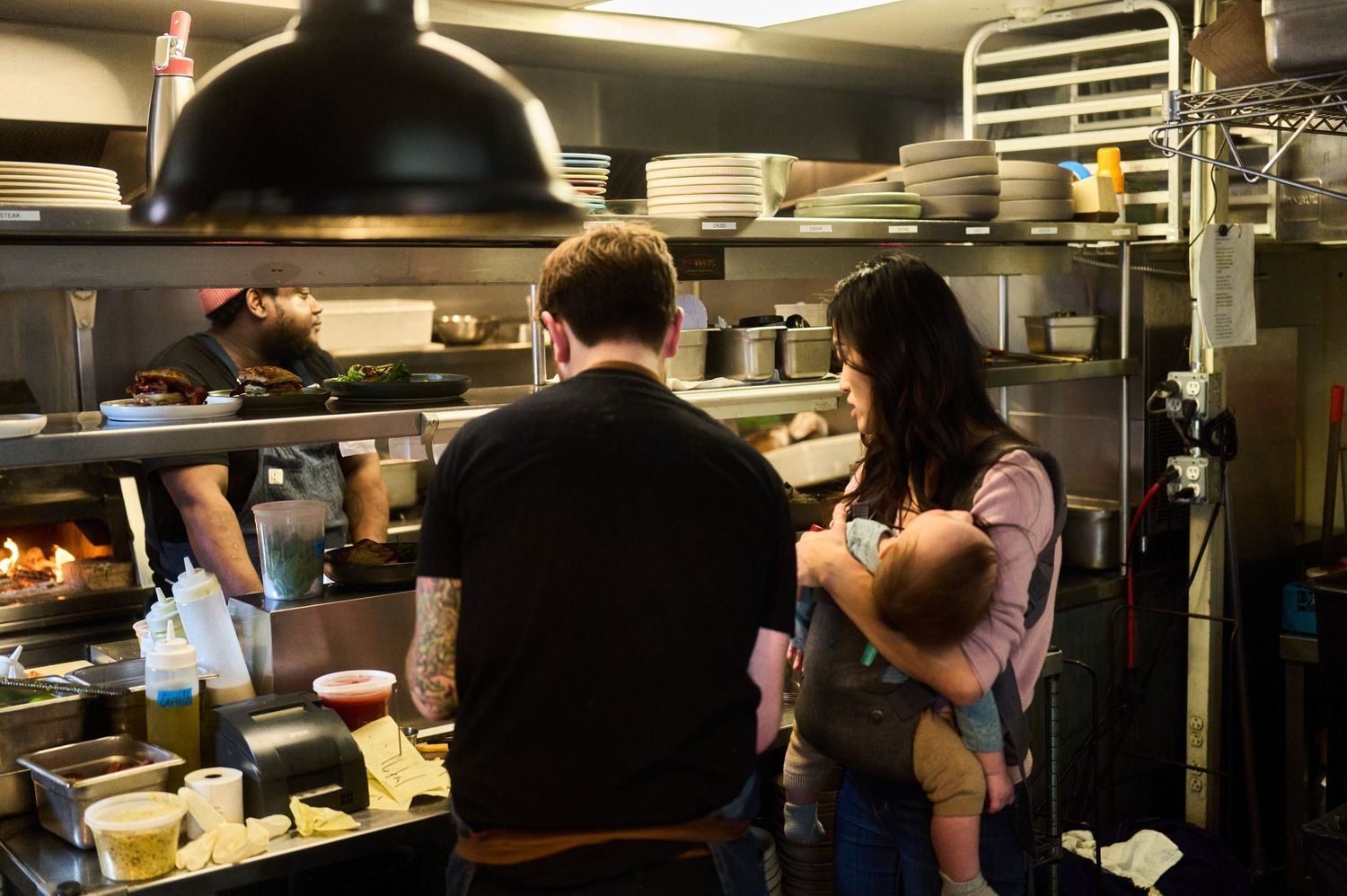 Family owned restaurant working behind the scenes during service hours.