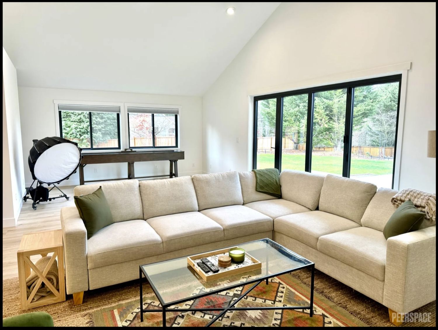 The Goat House photoshoot rental space in Bothell, WA for personal branding and headshots view of the space showing couch living room option