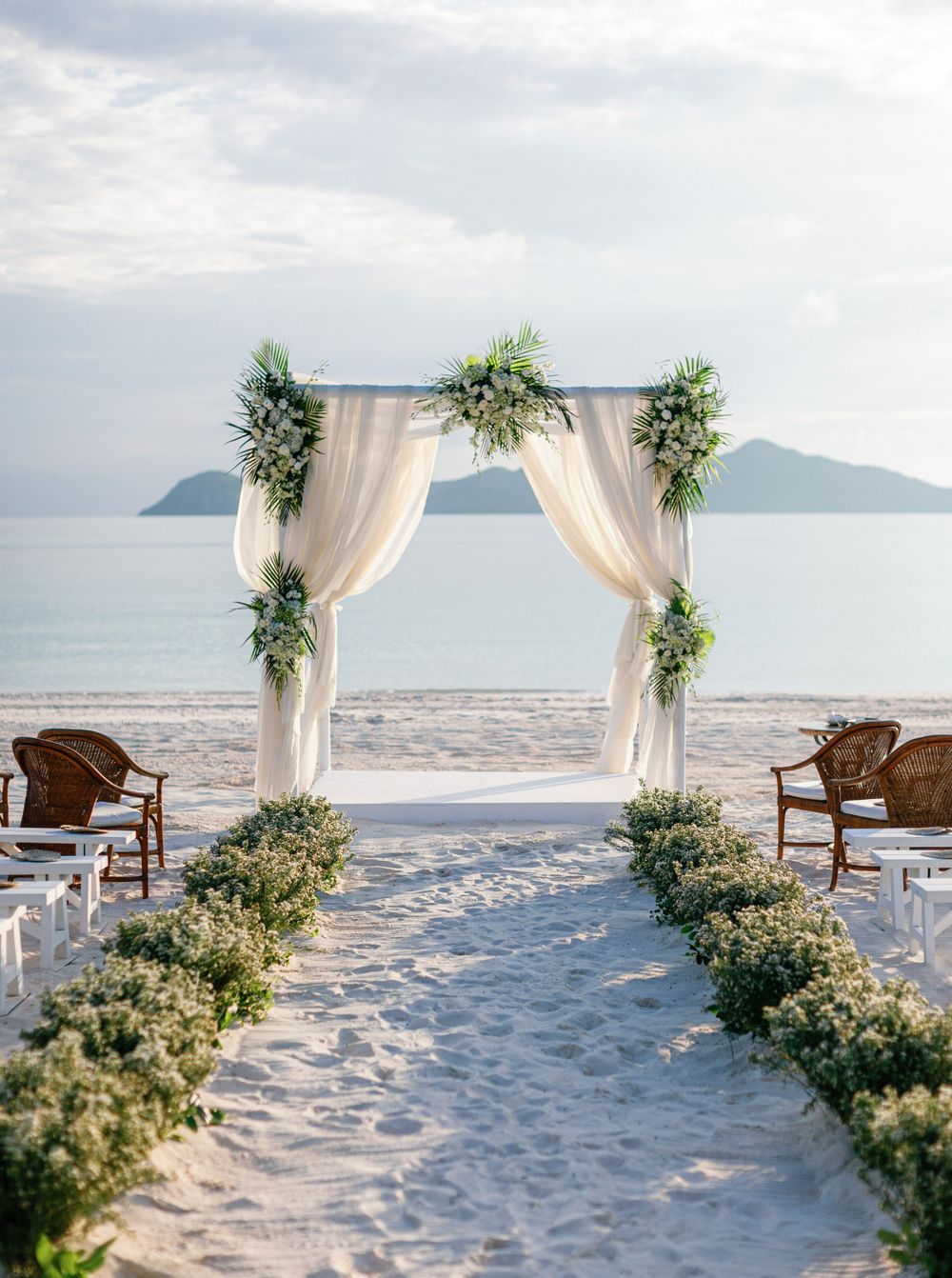 Beach wedding ceremony at Amanpulo, Philippines.