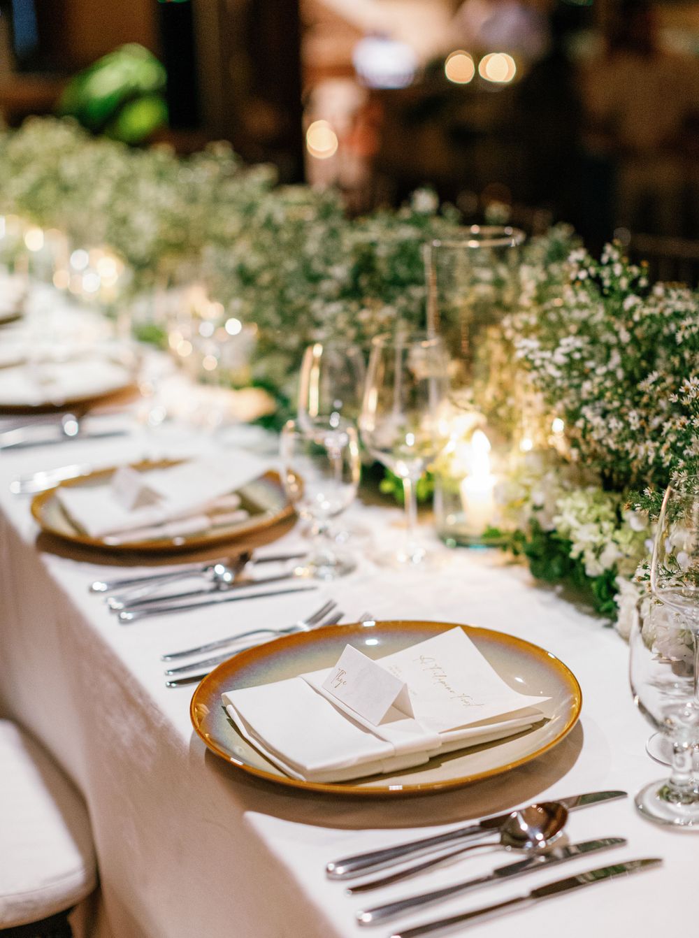 Elegant wedding reception at Aman resort in Amanpulo, Philippines.