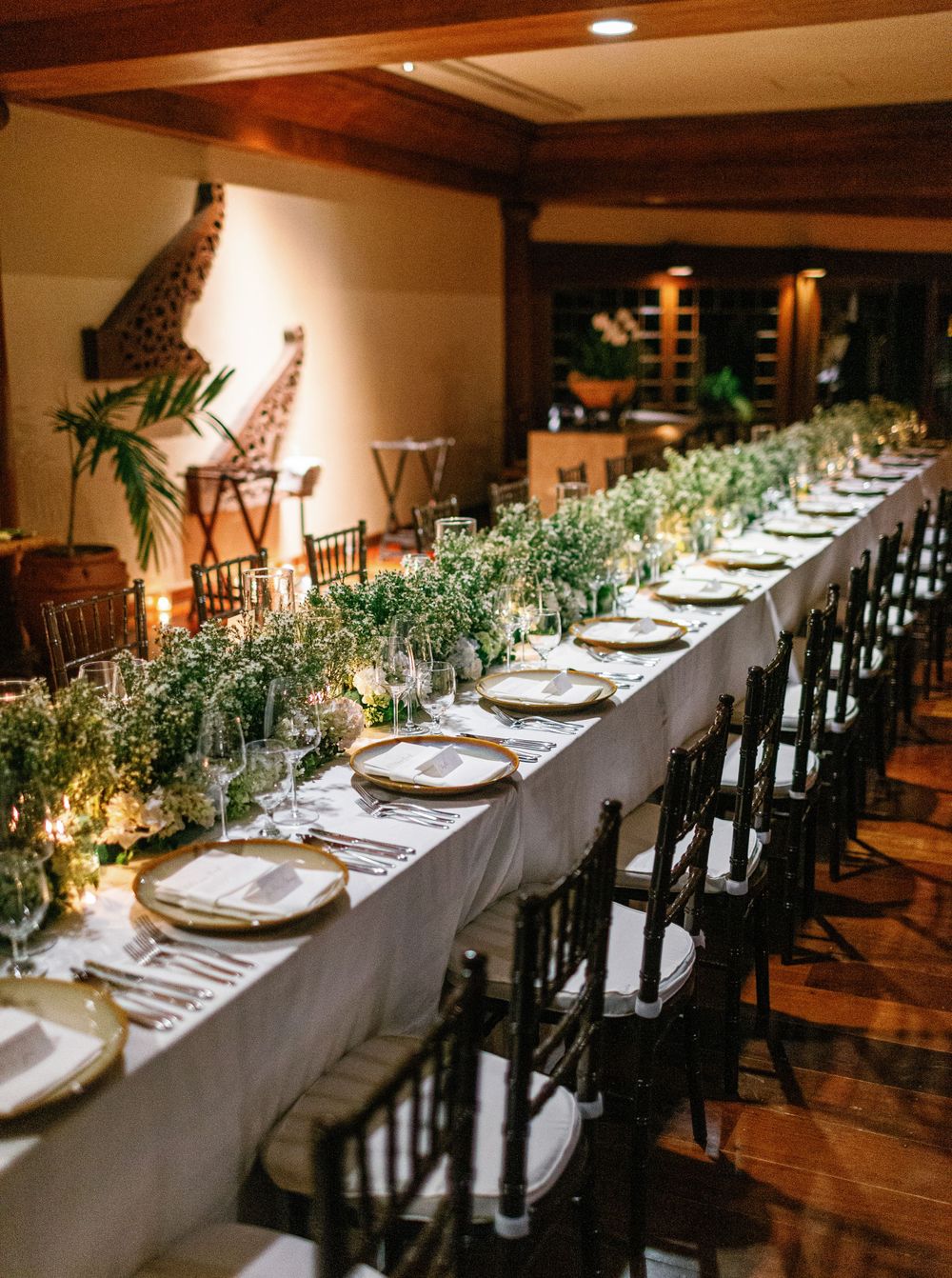 Beautiful wedding reception setup at Aman resort in Amanpulo, Philippines.