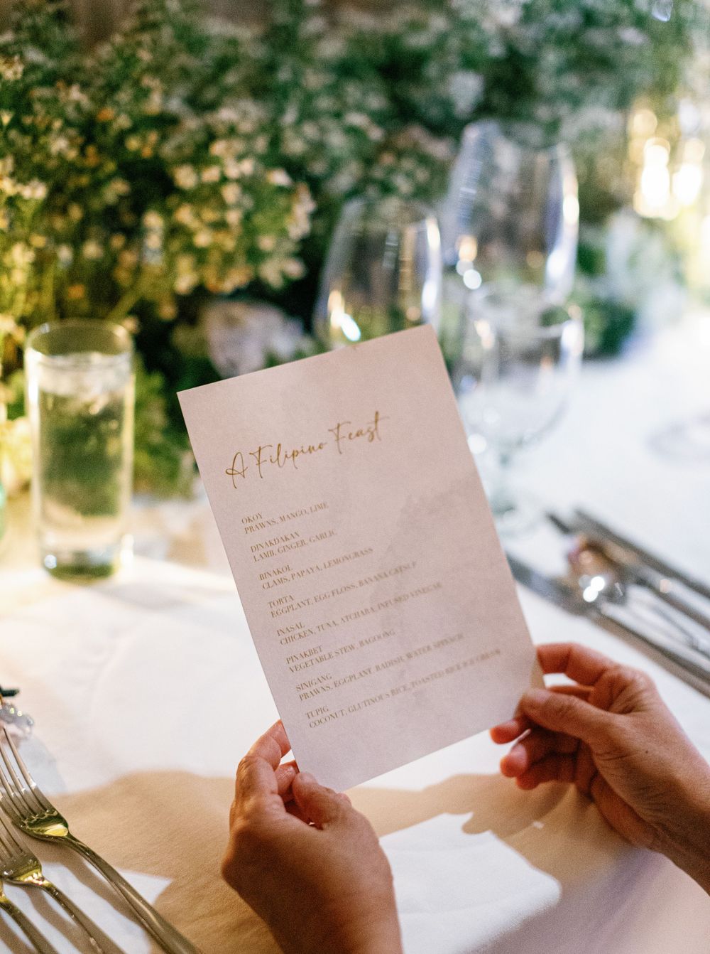 Menu for wedding reception at Aman resort in Amanpulo, Philippines.