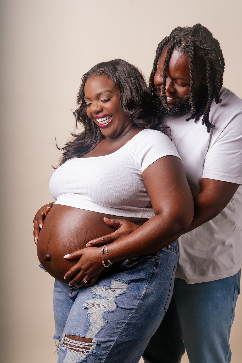 A series of maternity photos showing a couple embracing and celebrating pregnancy while wearing casual outfits.