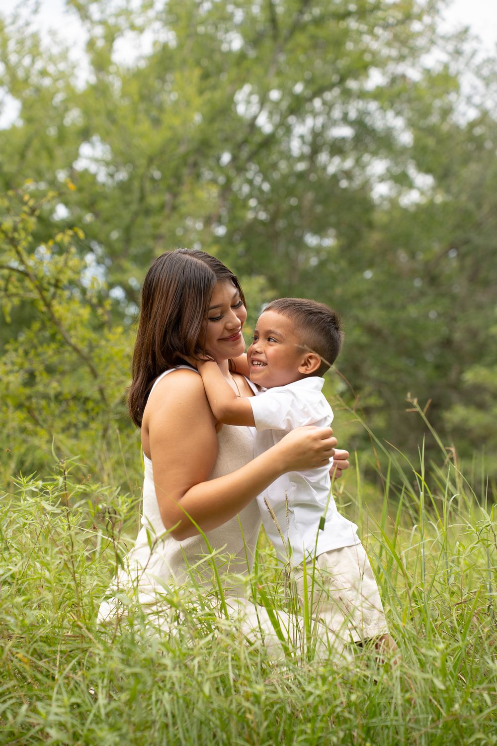 Mother and son enjoying time together in College Station, Texas, capturing loving moments and smiles.