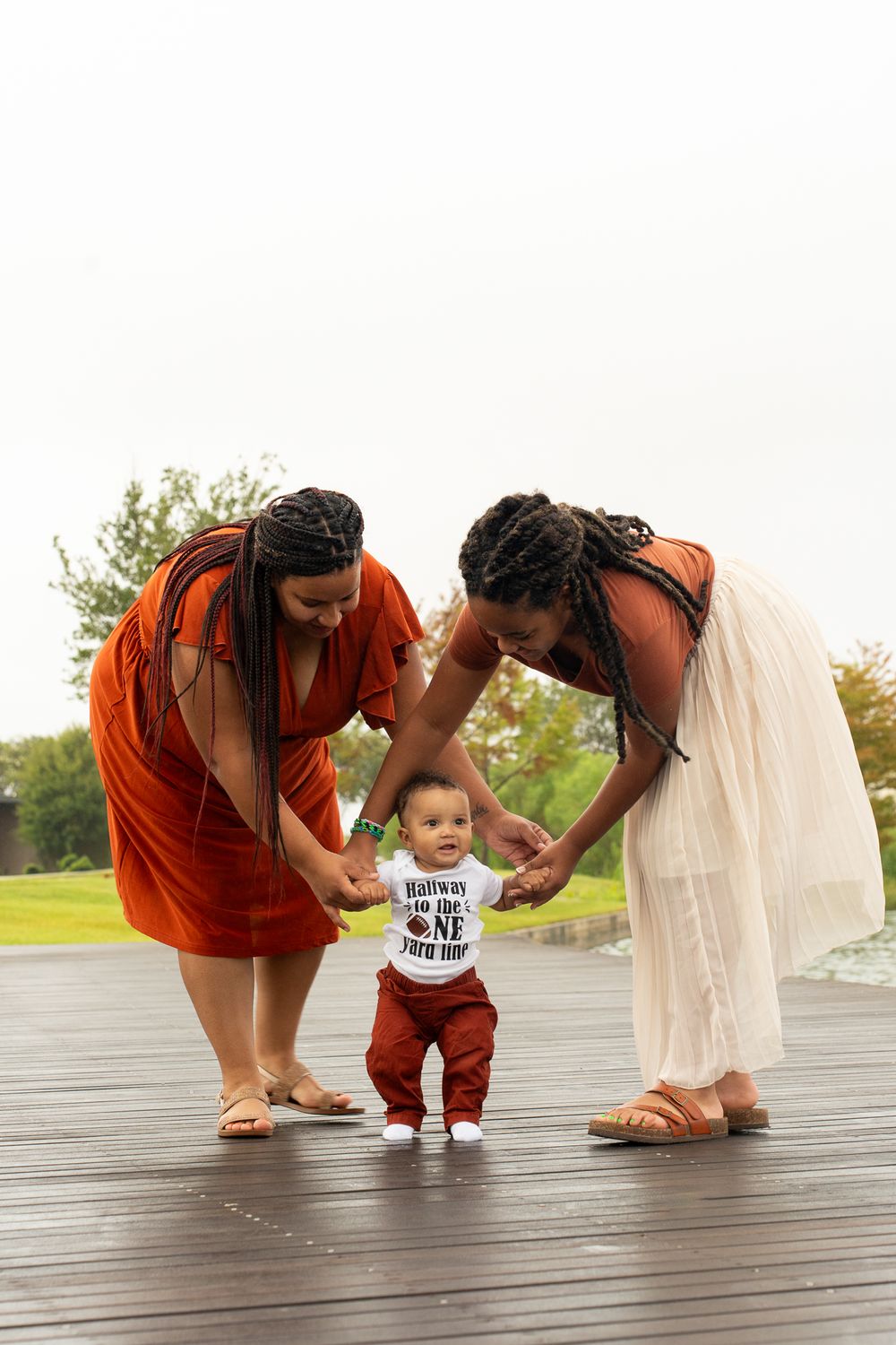 Family with a baby in College Station, Texas, capturing cherished moments and loving bonds.