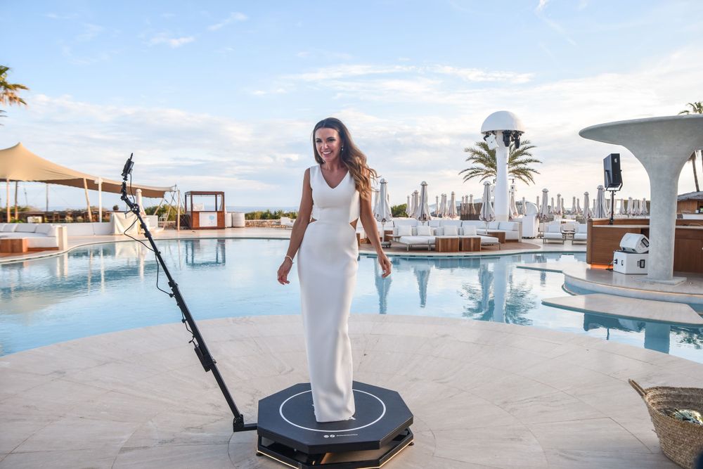 Bride having fun with the 360 video booth ibiza at destino ibiza