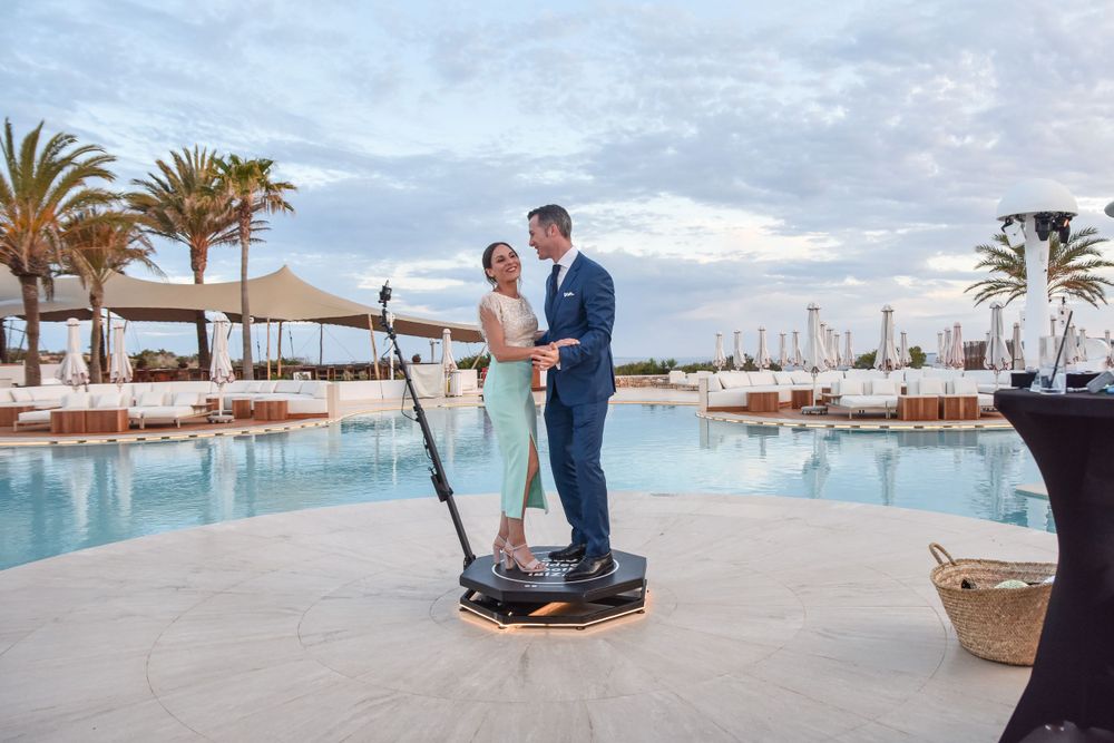 Wedding guests having fun with the 360 video booth ibiza.