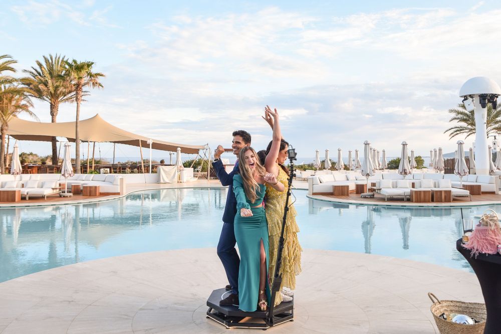 Wedding guests having fun with the 360 video booth ibiza.