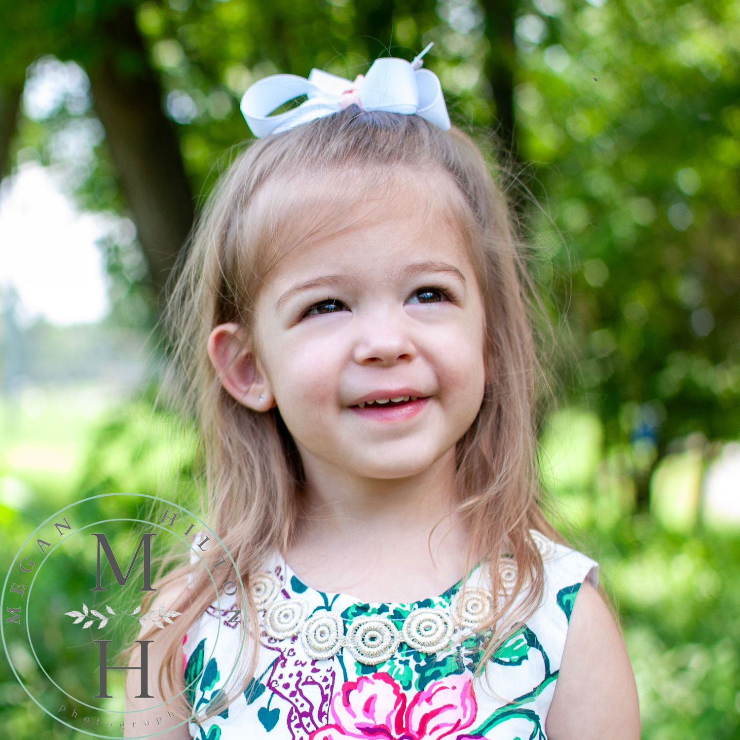 Photo of a toddler smiling at Baron Cameron Park.