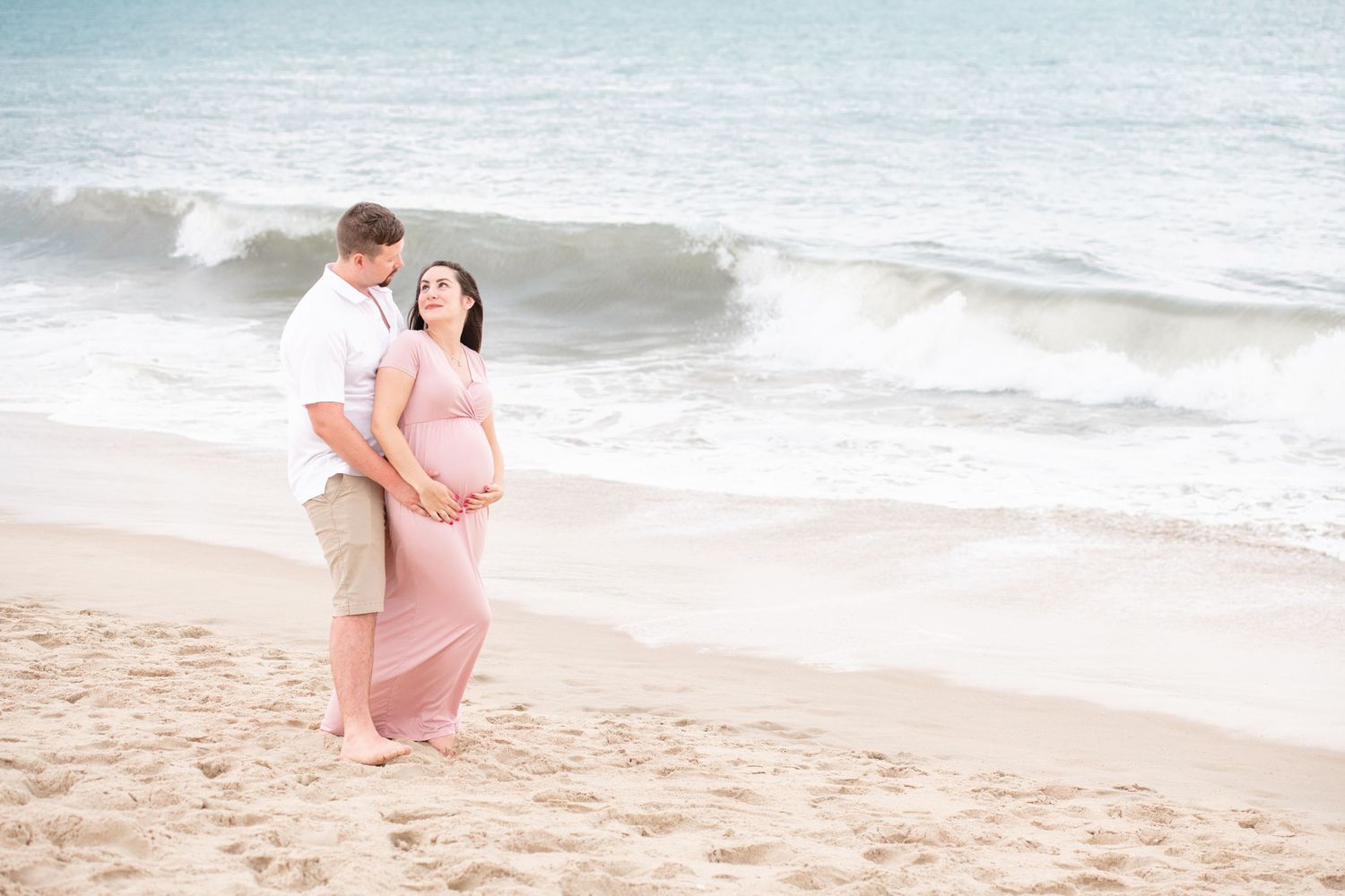 Maternity Photo along beach. Virginia Beach Photographer.
