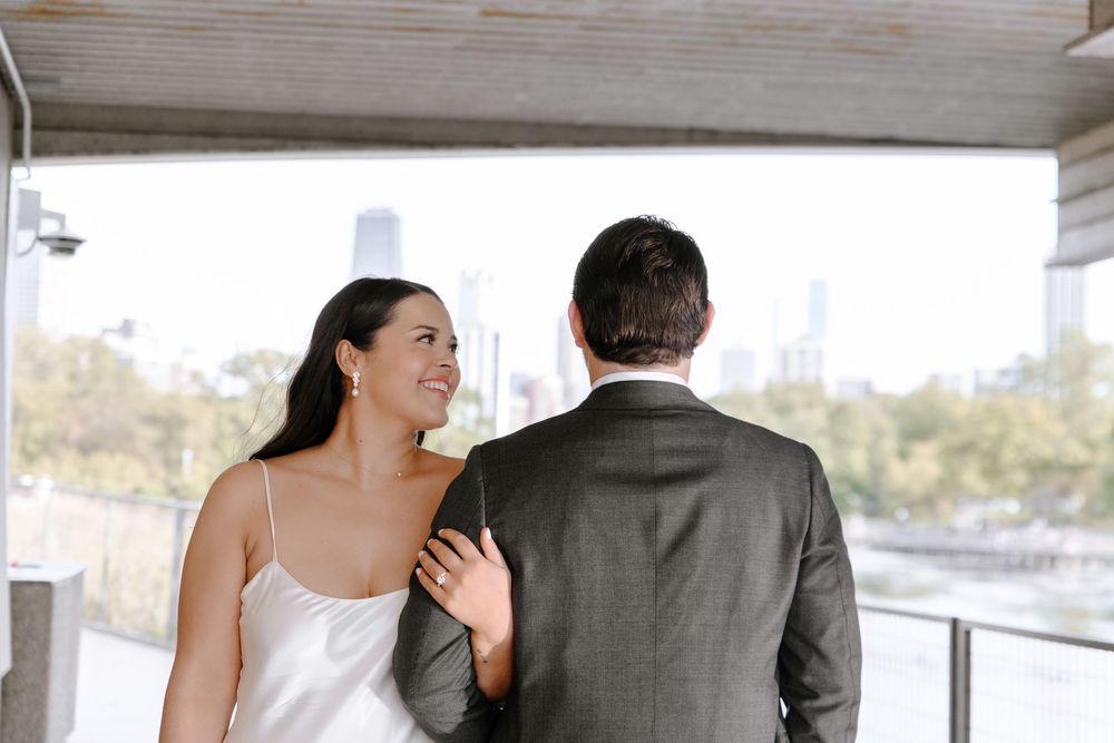 A collection of candid wedding moments captured of newlyweds in a covered outdoor setting with natural lighting.