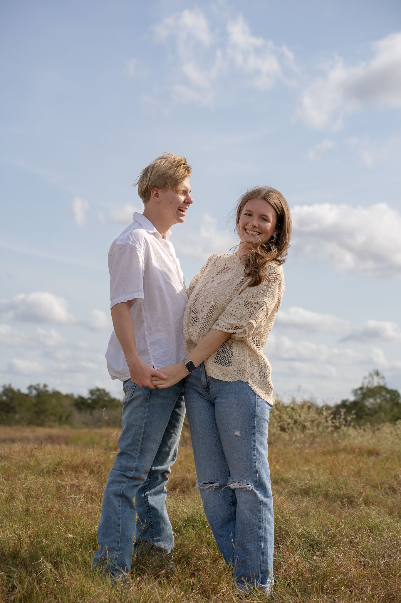 girl and boy holding hands and enjoying each others company