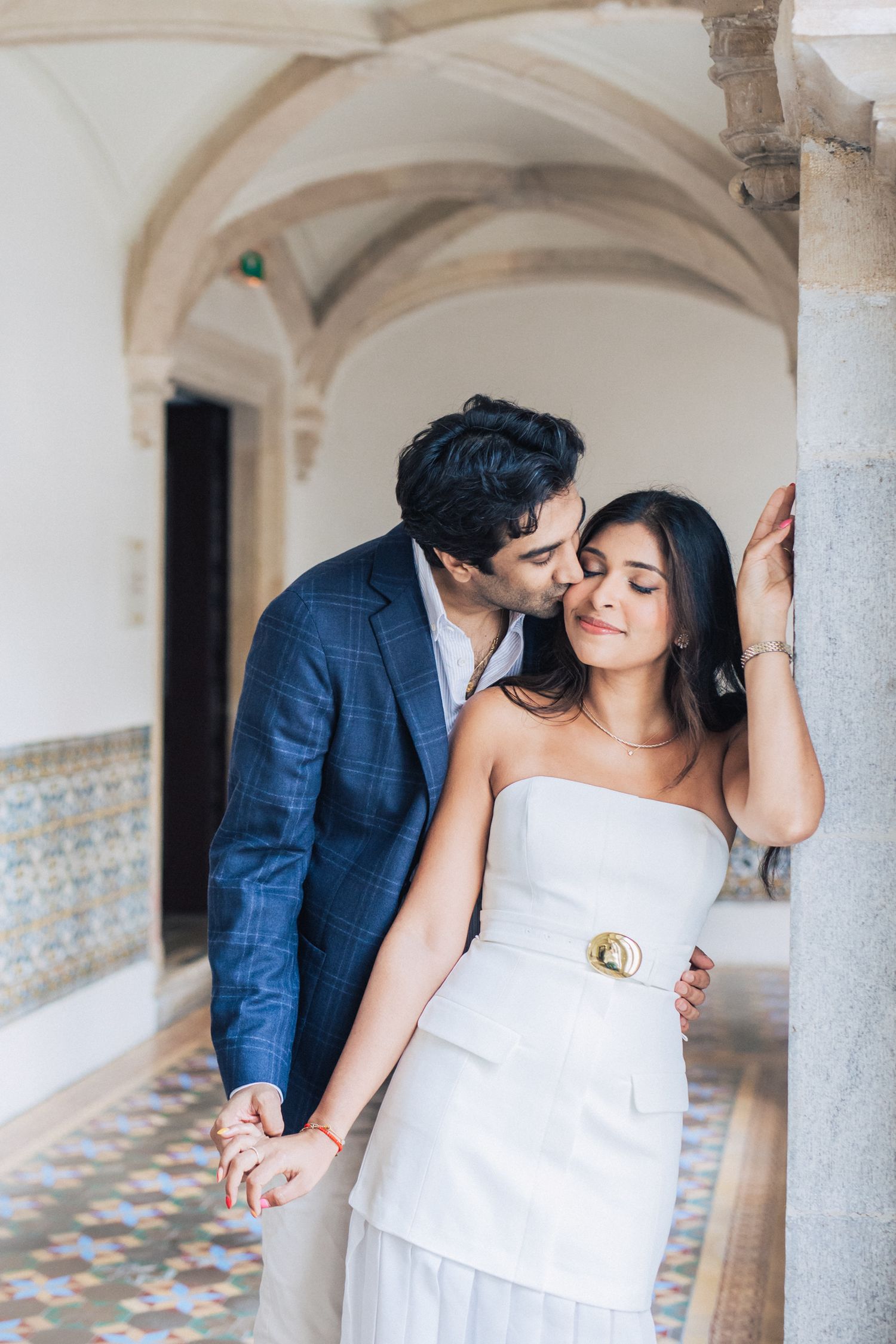 Romantic pre-wedding shoot in Sintra, Portugal, with an Indian couple exploring Penha Longa Resort. By a destination wedding Photographer