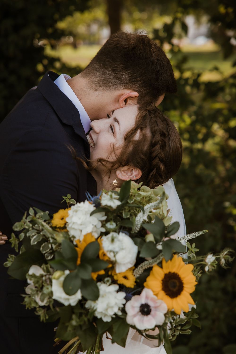 A joyful and emotional first look between bride and groom, captured by Poemas Photo + Video at their romantic summer wedding.