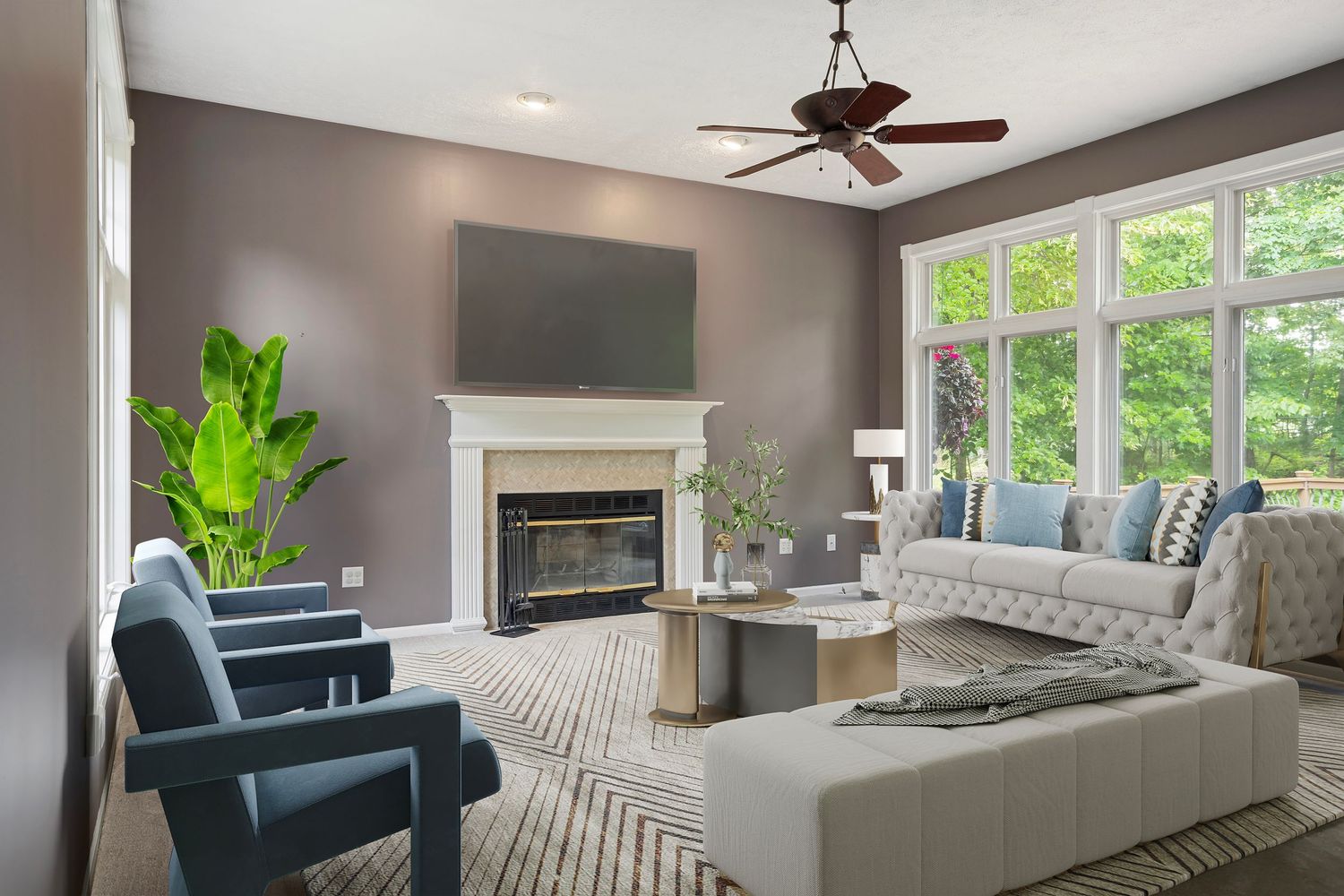Virtually staged living room with modern furniture, large windows, cozy fireplace, neutral tones, and stylish natural light design.