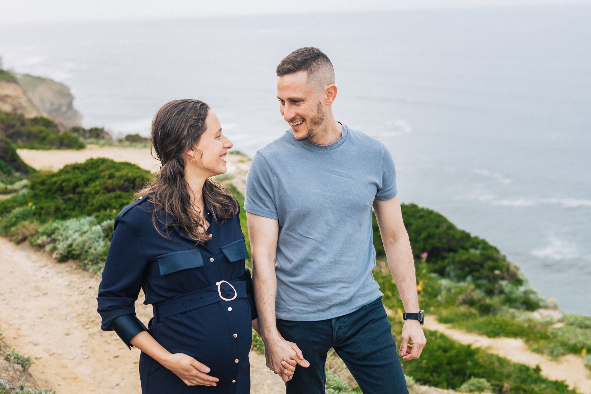 Natural and intimate pregnancy session at azenhas do Mar, portugal, capturing the beauty of a couple expecting their first child