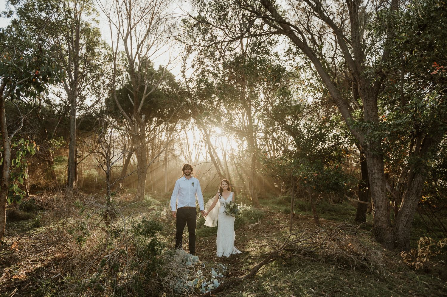romantic image of bride and groom by tasmanian elopement and wedding photographer joss jensen
