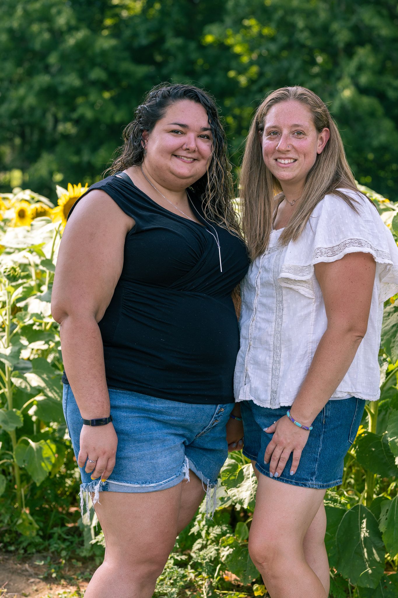 A couple posing during Sunflower Mini-Sessions