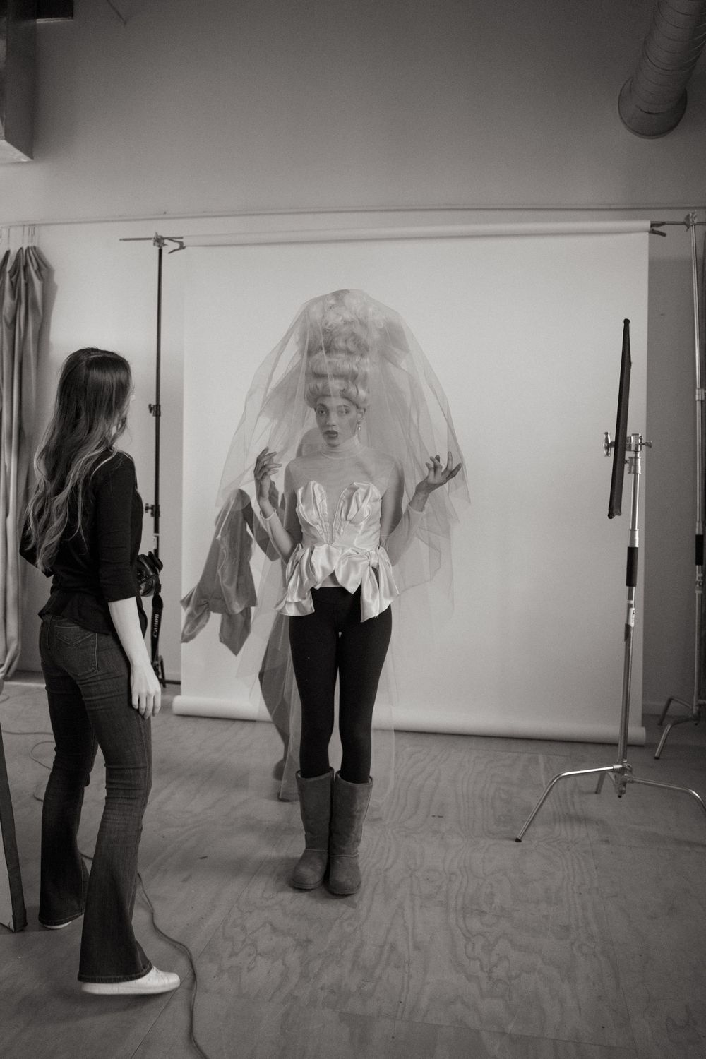Backstage photography in chicago showcasing collaborative effort of beauty teams and photographer.