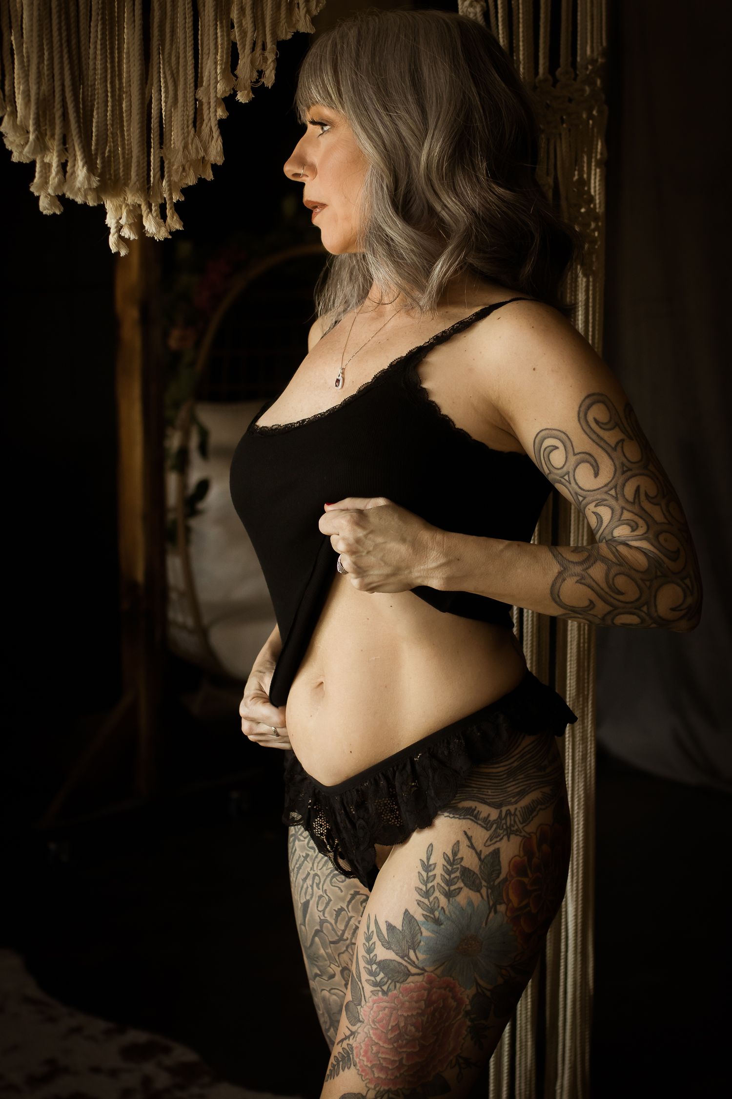 A woman celebrates her fiftieth birthday with an empowering boudoir session in Fort Worth, TX.