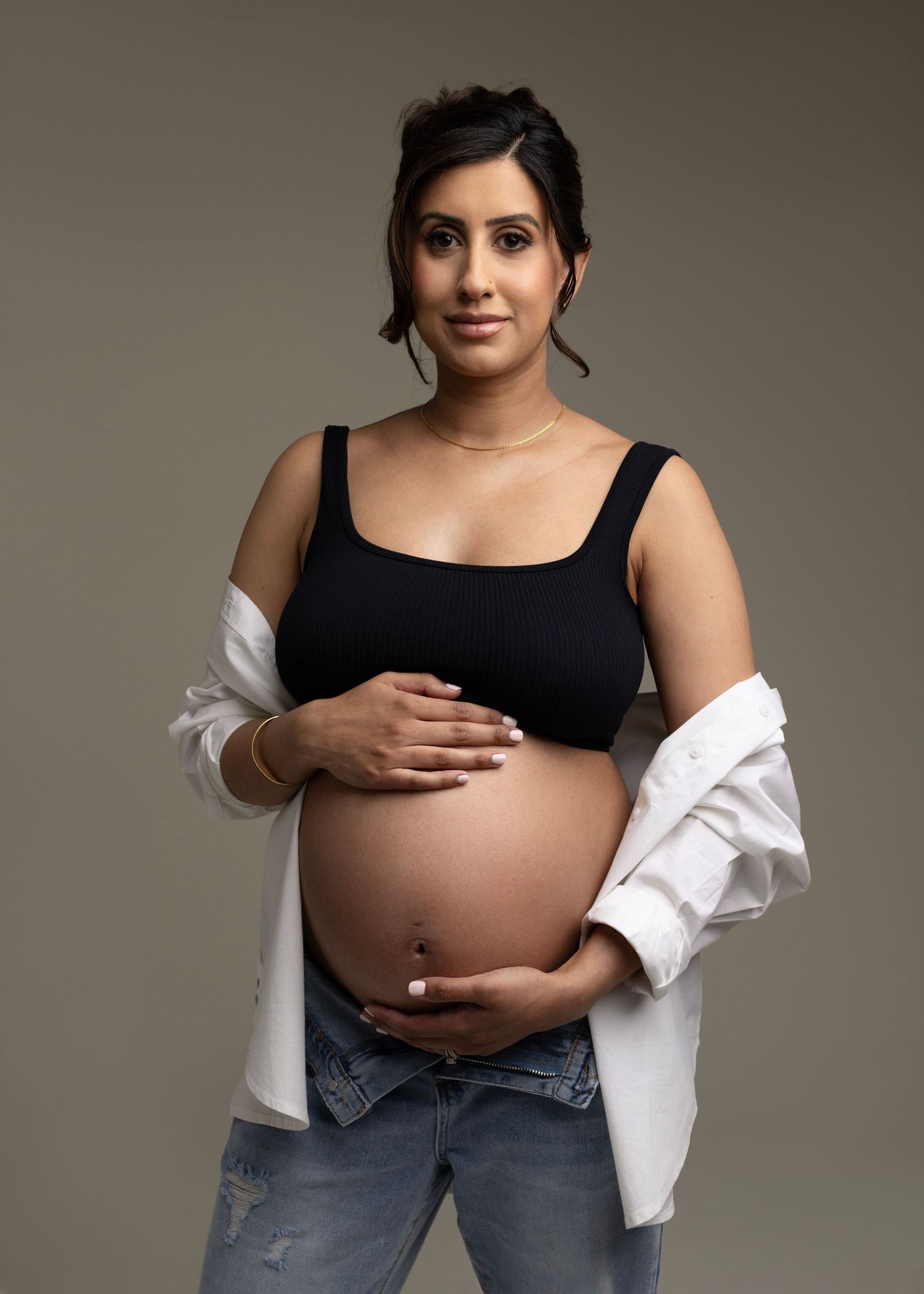 Gorgeous Rumneet awaits her new baby's arrival. Cloverdale. Surrey. Maternity Photography bump photos. Sleek black dress with cutout.