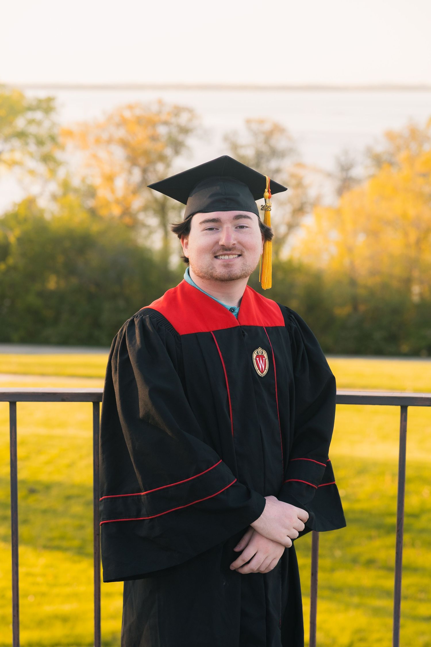 uw madison university of wisconsin alumni graduation graduates professional photos observatory lake mendota cap and gown headshot campus