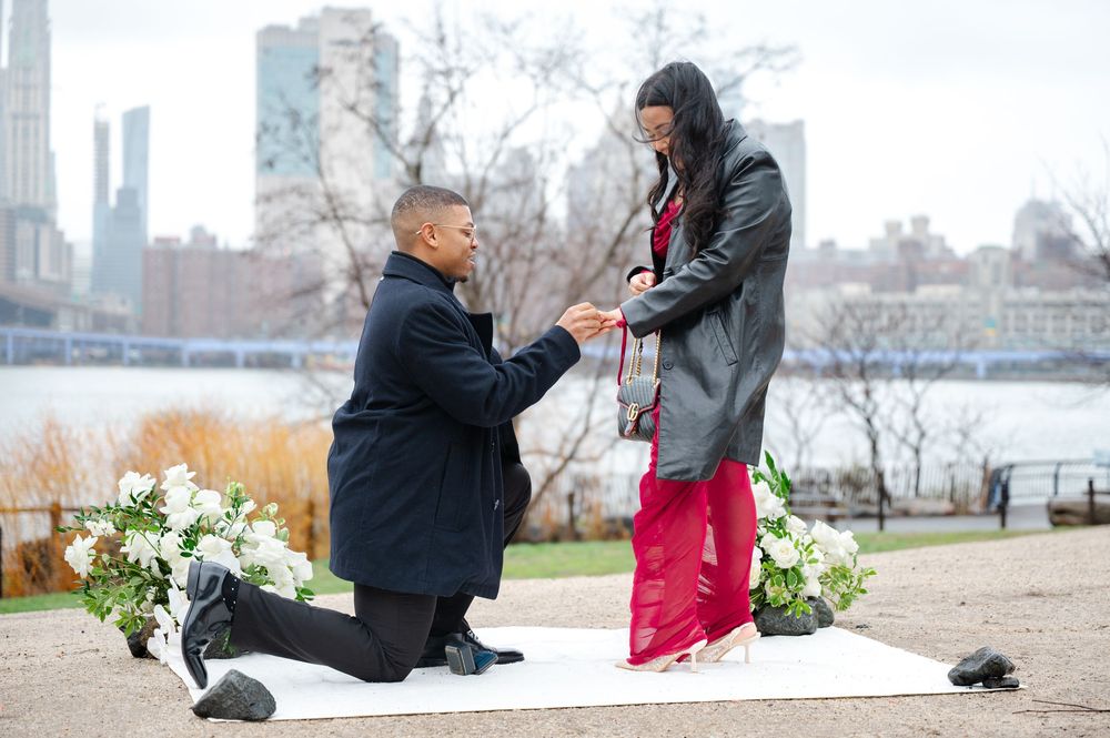 Romantic rainy day proposal scene in Brooklyn with spring flowers