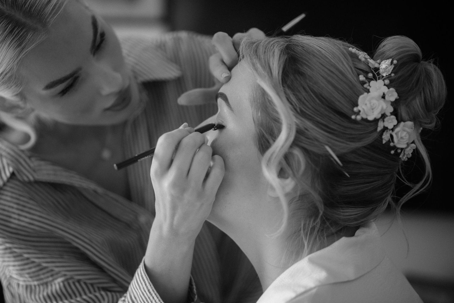 Close up black and white shot of a makeup application session. Tenerife Wedding Photographer at Hotel Vincci La Plantación del Sur