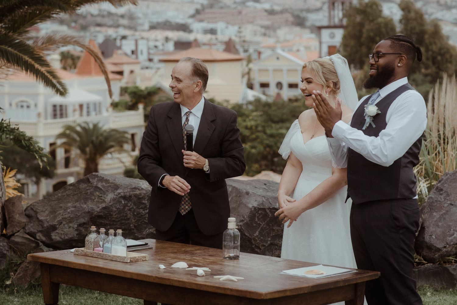 Wedding unity ceremony being performed at outdoor coastal venue. Tenerife Wedding Photographer at Hotel Vincci La Plantación del Sur