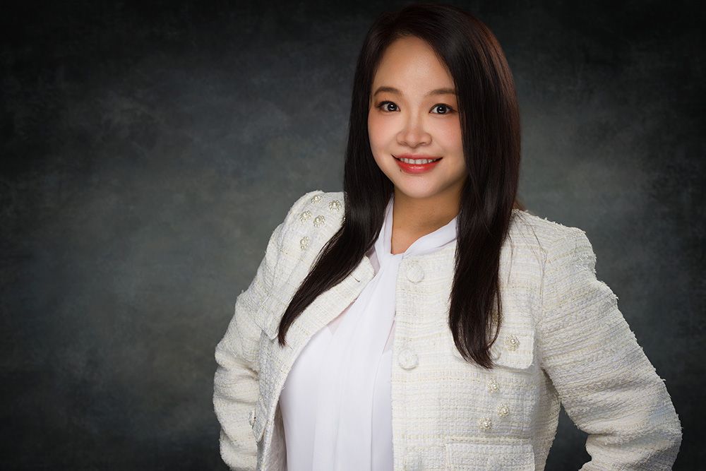 Professional headshot of a real estate agent in Easton, PA done on-location at client's office