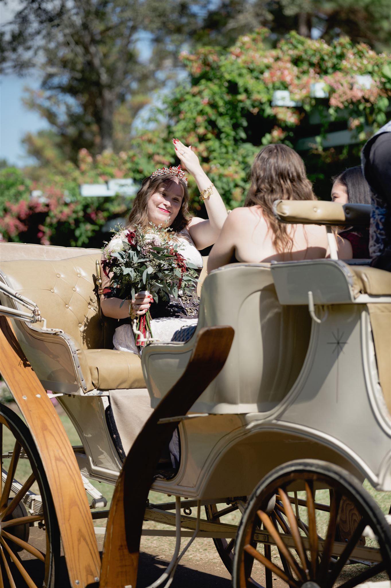 Series of four candid shots showing bridesmaids in a vintage carriage at an outdoor wedding in a floral garden setting.
