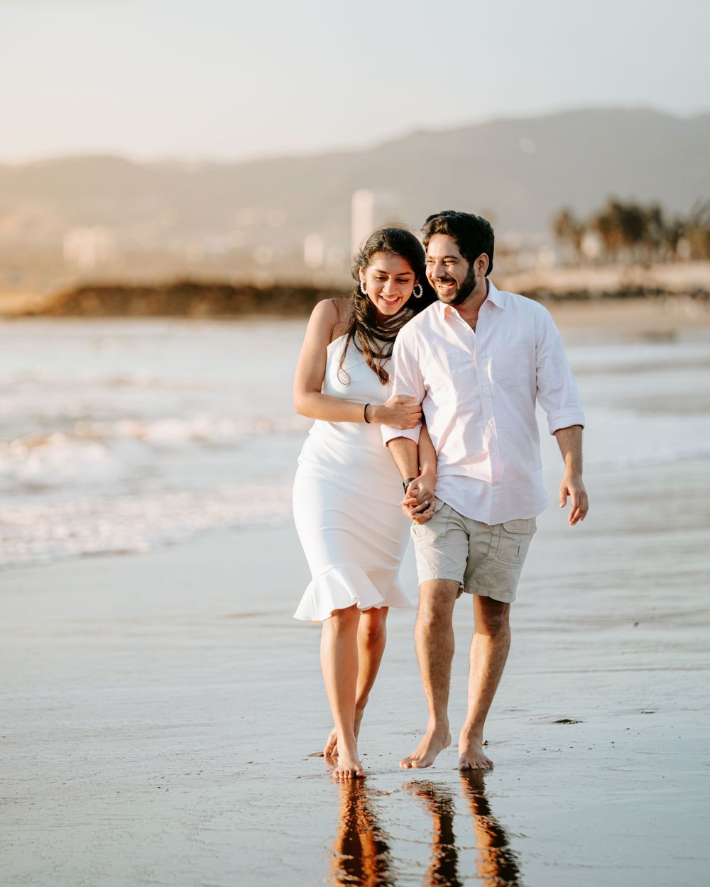 Capturing an Indian couple's engagement at a Los Angeles beach, photographed by a Dallas Indian wedding photographer.