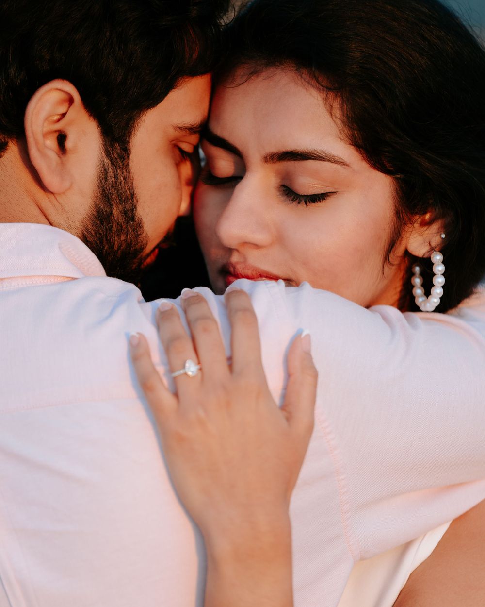 Indian couple's wedding engagement shoot at Los Angeles beach, captured by a Dallas Indian wedding photographer.