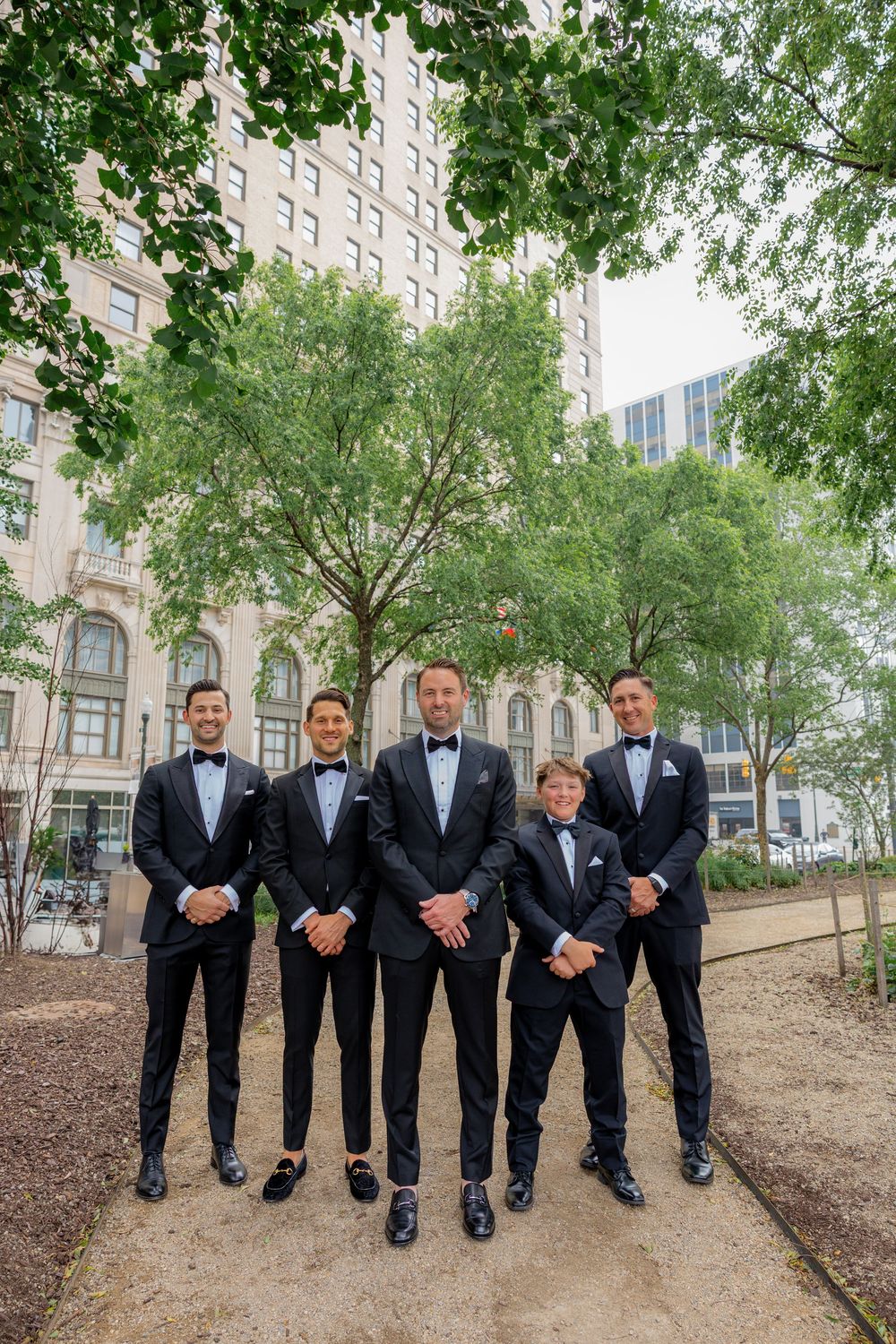 Fort Lauderdale wedding photographer capturing rooftop portraits of a Detroit bride and groom at Book Tower.